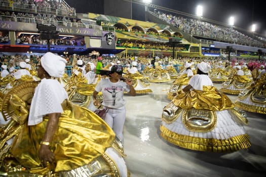 Rio de Janeiro, Brasil-  February 29, 2020: Samba Parade at the 2020 Carnival Champions Parade, Sambodromo. It's raining