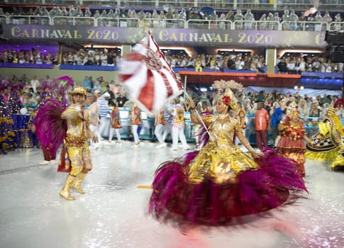 Rio de Janeiro, Brasil-  February 29, 2020: Samba Parade at the 2020 Carnival Champions Parade, Sambodromo. It's raining