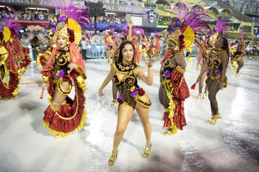 Rio de Janeiro, Brasil-  February 29, 2020: Samba Parade at the 2020 Carnival Champions Parade, Sambodromo. It's raining