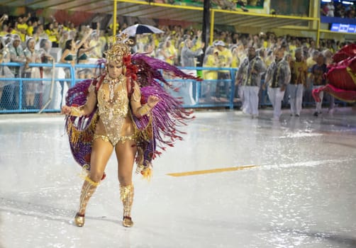 Rio de Janeiro, Brasil-  February 29, 2020: Samba Parade at the 2020 Carnival Champions Parade, Sambodromo. It's raining