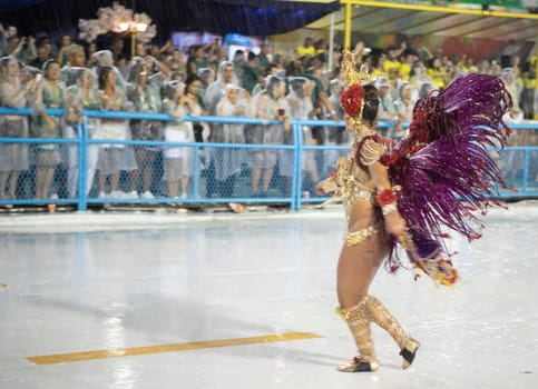 Rio de Janeiro, Brasil-  February 29, 2020: Samba Parade at the 2020 Carnival Champions Parade, Sambodromo. It's raining