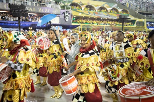 Rio de Janeiro, Brasil-  February 29, 2020: Samba Parade at the 2020 Carnival Champions Parade, Sambodromo. It's raining