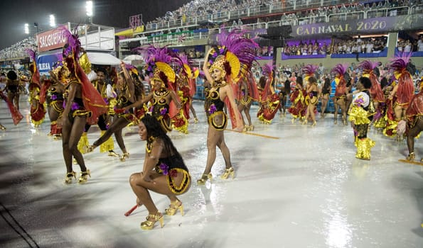 Rio de Janeiro, Brasil-  February 29, 2020: Samba Parade at the 2020 Carnival Champions Parade, Sambodromo. It's raining