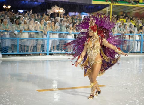 Rio de Janeiro, Brasil-  February 29, 2020: Samba Parade at the 2020 Carnival Champions Parade, Sambodromo. It's raining