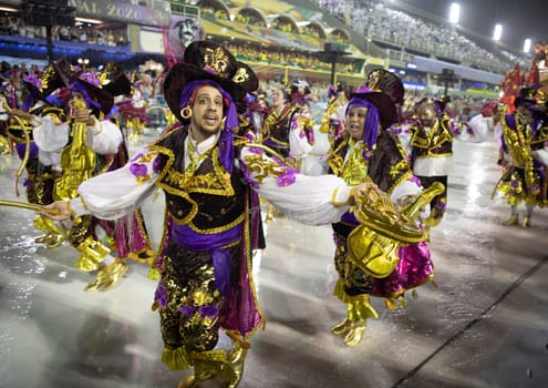 Rio de Janeiro, Brasil-  February 29, 2020: Samba Parade at the 2020 Carnival Champions Parade, Sambodromo. It's raining