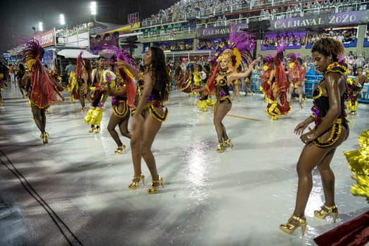 Rio de Janeiro, Brasil-  February 29, 2020: Samba Parade at the 2020 Carnival Champions Parade, Sambodromo. It's raining