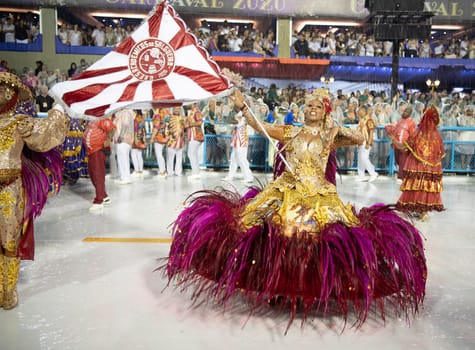 Rio de Janeiro, Brasil-  February 29, 2020: Samba Parade at the 2020 Carnival Champions Parade, Sambodromo. It's raining