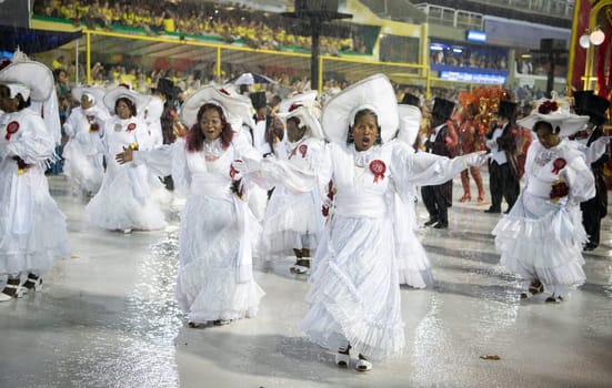 Rio de Janeiro, Brasil-  February 29, 2020: Samba Parade at the 2020 Carnival Champions Parade, Sambodromo. It's raining