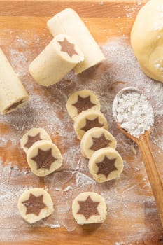 Baking christmas cookies with chocolate star. Homemade bakery, xmas sweet, winter holidays concept.