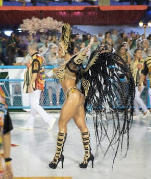 Rio de Janeiro, Brasil-  February 29, 2020: Samba Parade at the 2020 Carnival Champions Parade, Sambodromo. It's raining