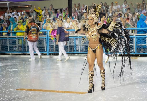 Rio de Janeiro, Brasil-  February 29, 2020: Samba Parade at the 2020 Carnival Champions Parade, Sambodromo. It's raining