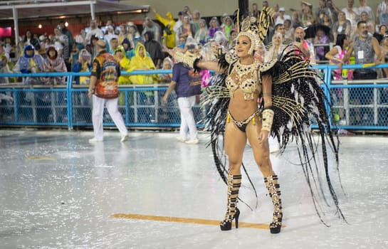 Rio de Janeiro, Brasil-  February 29, 2020: Samba Parade at the 2020 Carnival Champions Parade, Sambodromo. It's raining
