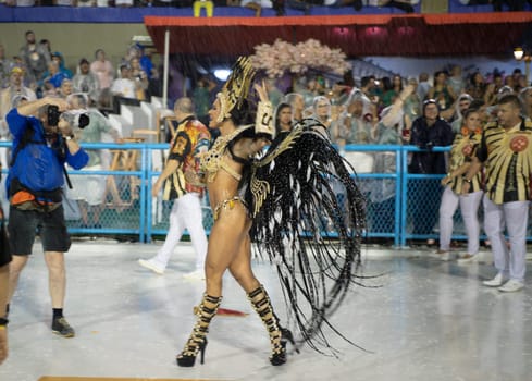 Rio de Janeiro, Brasil-  February 29, 2020: Samba Parade at the 2020 Carnival Champions Parade, Sambodromo. It's raining