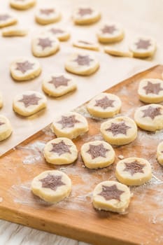 Baking christmas cookies with chocolate star. Homemade bakery, xmas sweet, winter holidays concept.