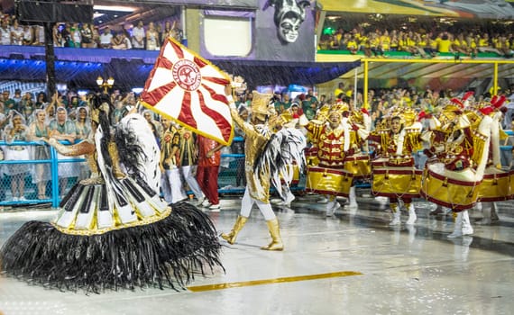 Rio de Janeiro, Brasil-  February 29, 2020: Samba Parade at the 2020 Carnival Champions Parade, Sambodromo. It's raining