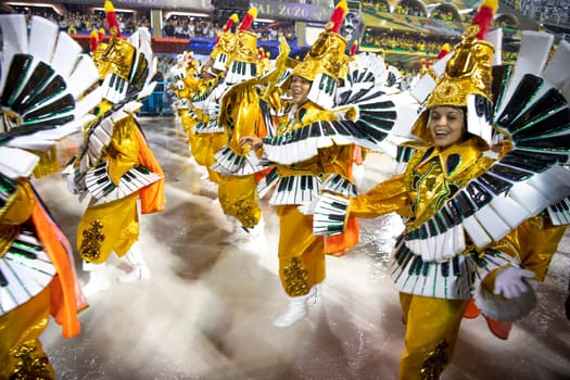 Rio de Janeiro, Brasil-  February 29, 2020: Samba Parade at the 2020 Carnival Champions Parade, Sambodromo. It's raining