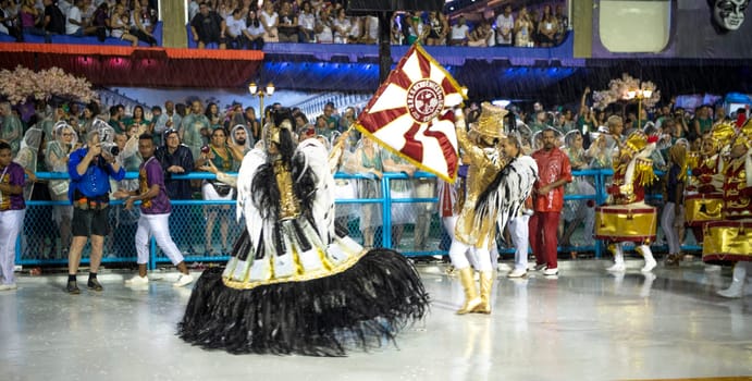 Rio de Janeiro, Brasil-  February 29, 2020: Samba Parade at the 2020 Carnival Champions Parade, Sambodromo. It's raining