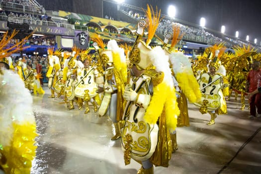 Rio de Janeiro, Brasil-  February 29, 2020: Samba Parade at the 2020 Carnival Champions Parade, Sambodromo. It's raining