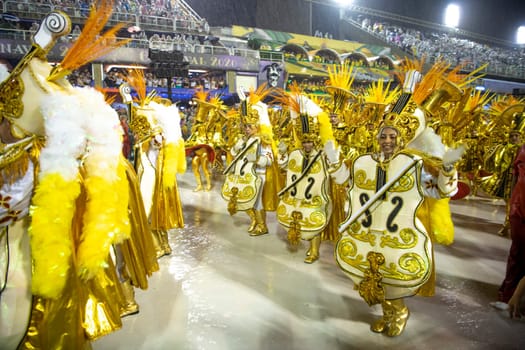 Rio de Janeiro, Brasil-  February 29, 2020: Samba Parade at the 2020 Carnival Champions Parade, Sambodromo. It's raining
