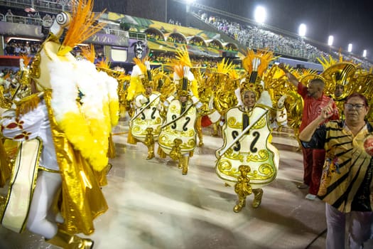 Rio de Janeiro, Brasil-  February 29, 2020: Samba Parade at the 2020 Carnival Champions Parade, Sambodromo. It's raining