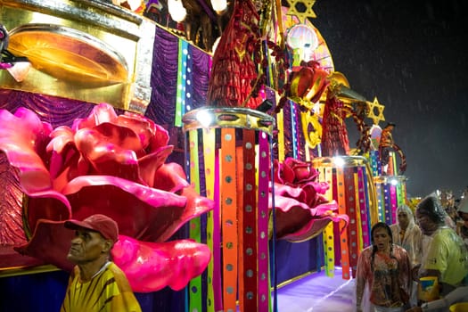 Rio de Janeiro, Brasil-  February 29, 2020: Samba Parade at the 2020 Carnival Champions Parade, Sambodromo. It's raining