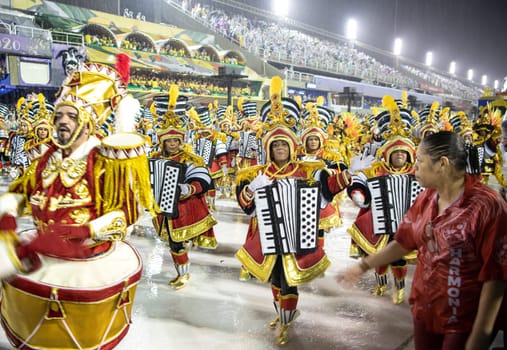 Rio de Janeiro, Brasil-  February 29, 2020: Samba Parade at the 2020 Carnival Champions Parade, Sambodromo. It's raining