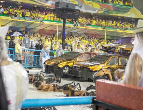 Rio de Janeiro, Brasil-  February 29, 2020: Samba Parade at the 2020 Carnival, Champions Parade, Sambodromo. It's raining