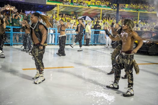 Rio de Janeiro, Brasil-  February 29, 2020: Samba Parade at the 2020 Carnival, Champions Parade, Sambodromo. It's raining