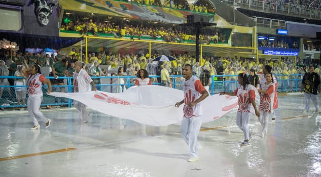 Rio de Janeiro, Brasil-  February 29, 2020: Samba Parade at the 2020 Carnival, Champions Parade, Sambodromo. It's raining