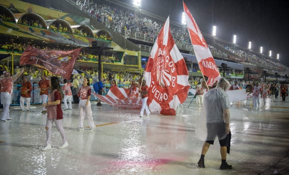 Rio de Janeiro, Brasil-  February 29, 2020: Samba Parade at the 2020 Carnival, Champions Parade, Sambodromo. It's raining