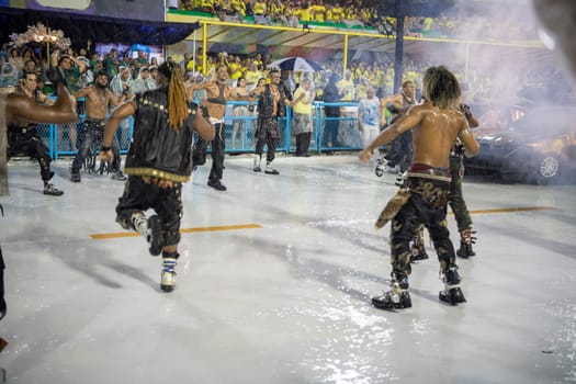 Rio de Janeiro, Brasil-  February 29, 2020: Samba Parade at the 2020 Carnival, Champions Parade, Sambodromo. It's raining