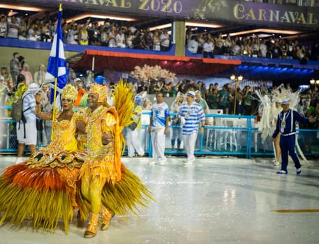 Rio de Janeiro, Brasil-  February 29, 2020: Samba Parade at the 2020 Carnival, Champions Parade, Sambodromo. It's raining