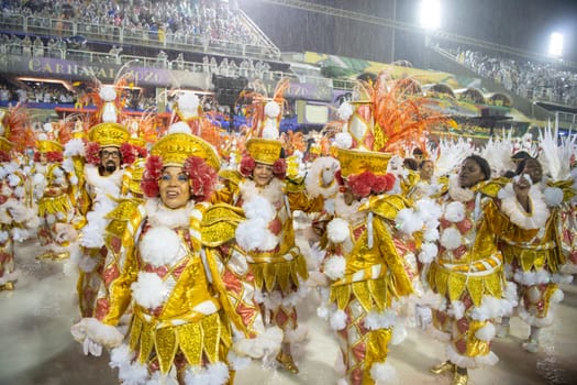 Rio de Janeiro, Brasil-  February 29, 2020: Samba Parade at the 2020 Carnival, Champions Parade, Sambodromo. It's raining