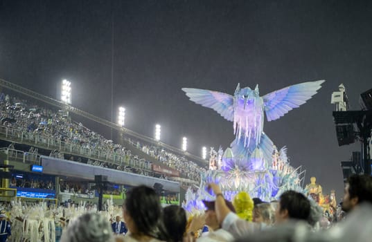 Rio de Janeiro, Brasil-  February 29, 2020: Samba Parade at the 2020 Carnival, Champions Parade, Sambodromo. It's raining