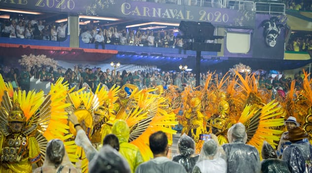 Rio de Janeiro, Brasil-  February 29, 2020: Samba Parade at the 2020 Carnival, Champions Parade, Sambodromo. It's raining