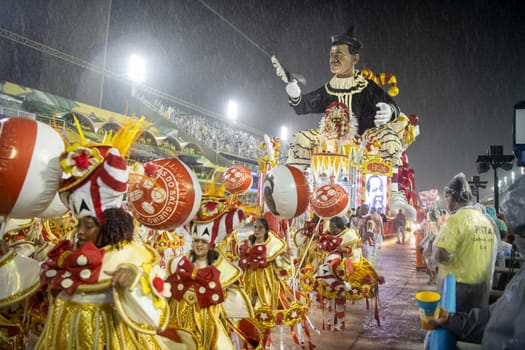 Rio de Janeiro, Brasil-  February 29, 2020: Samba Parade at the 2020 Carnival,Champions Parade, Sambodromo. It's raining