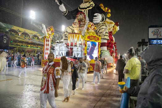 Rio de Janeiro, Brasil-  February 29, 2020: Samba Parade at the 2020 Carnival, Champions Parade, Sambodromo. It's raining