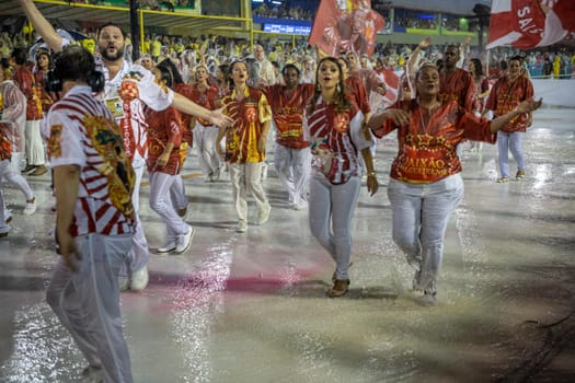 Rio de Janeiro, Brasil-  February 29, 2020: Samba Parade at the 2020 Carnival, Champions Parade, Sambodromo. It's raining