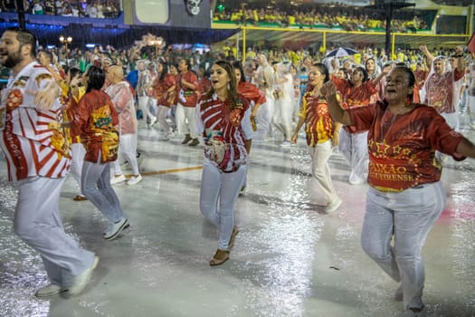 Rio de Janeiro, Brasil-  February 29, 2020: Samba Parade at the 2020 Carnival, Champions Parade, Sambodromo. It's raining