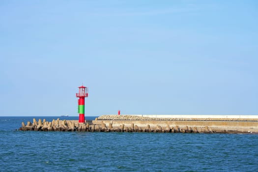 Lighthouse at the port entrance in Swinoujscie on the Polish Baltic coast