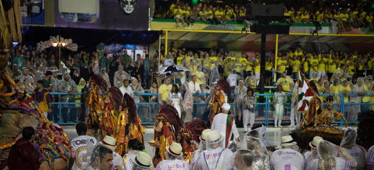 Rio de Janeiro, Brasil-  February 29, 2020: Samba Parade at the 2020 Carnival, Champions Parade, Sambodromo. It's raining