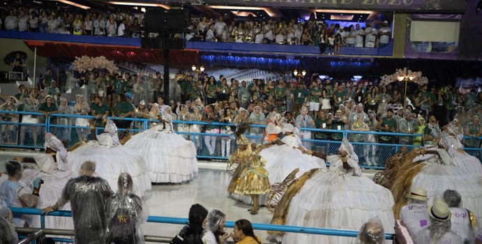 Rio de Janeiro, Brasil-  February 29, 2020: Samba Parade at the 2020 Carnival, Champions Parade, Sambodromo. It's raining