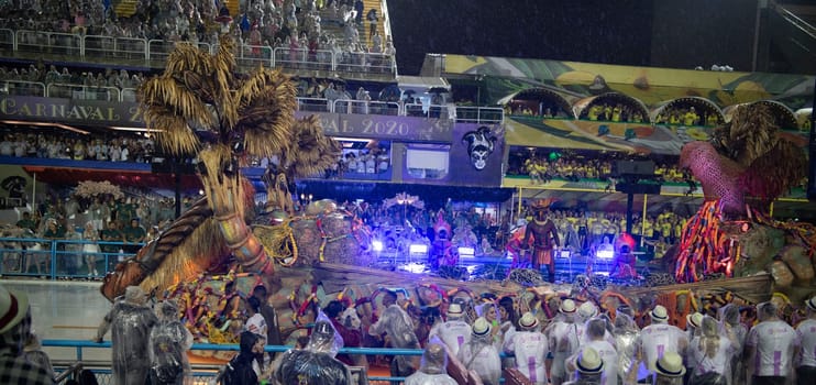 Rio de Janeiro, Brasil-  February 29, 2020: Samba Parade at the 2020 Carnival, Champions Parade, Sambodromo. It's raining