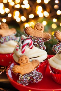 Yummy Cupcakes with butter cream frosting and gingerbread cookies for Christmas