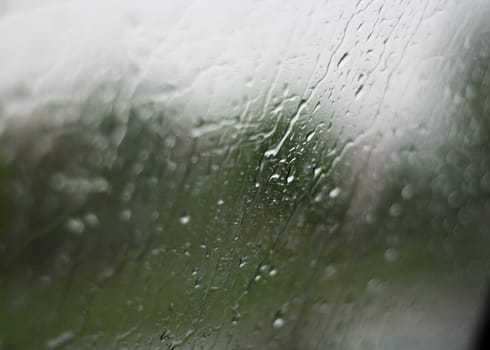 Rain on the window of the car - close of water