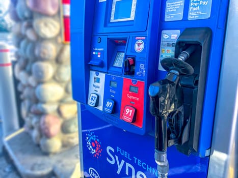 Calgary, Alberta, Canada. Nov 15, 2020. A ESSO Gas Station Pump. Petrol pump filling nozzles