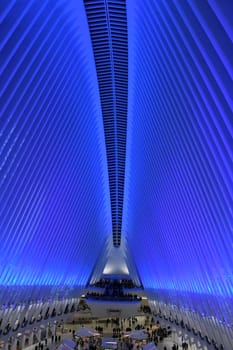 The blue main hall in the Oculus of the World Trade Center Station. PATH. It is located next to the 9/11 Memorial in New York,Manhattan