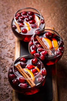 Mulled wine with orange, cranberries and cinnamon and anise