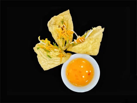 Malay cuisine or Stuffed Tofu called Tauhu sumbat on black background