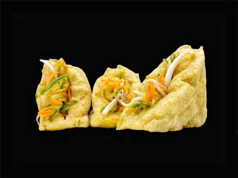 Malay cuisine or Stuffed Tofu called Tauhu sumbat on black background